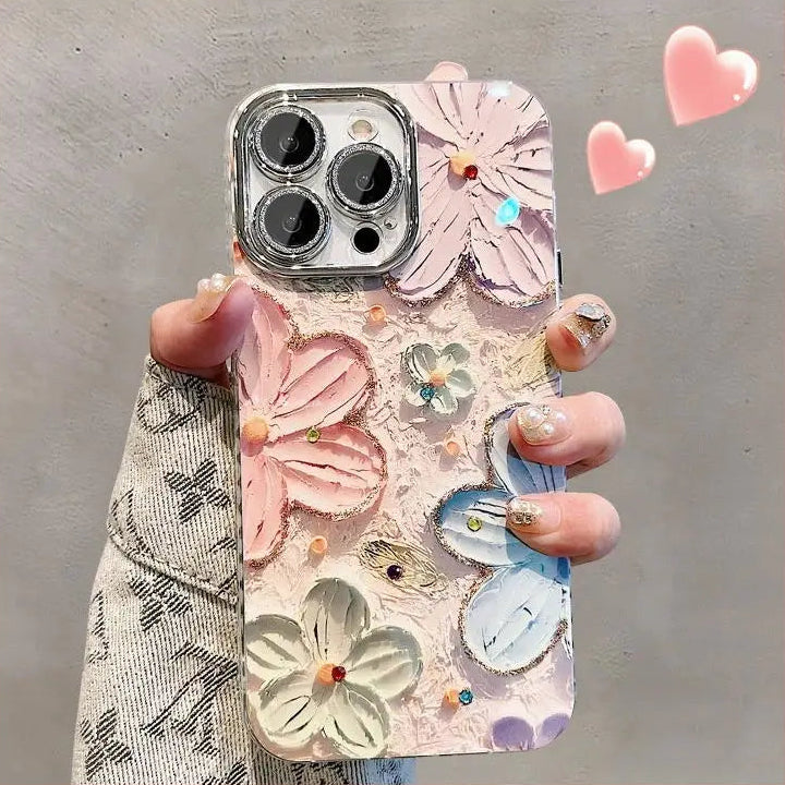 Phone case with kawaii floral design held by a hand on a gray background