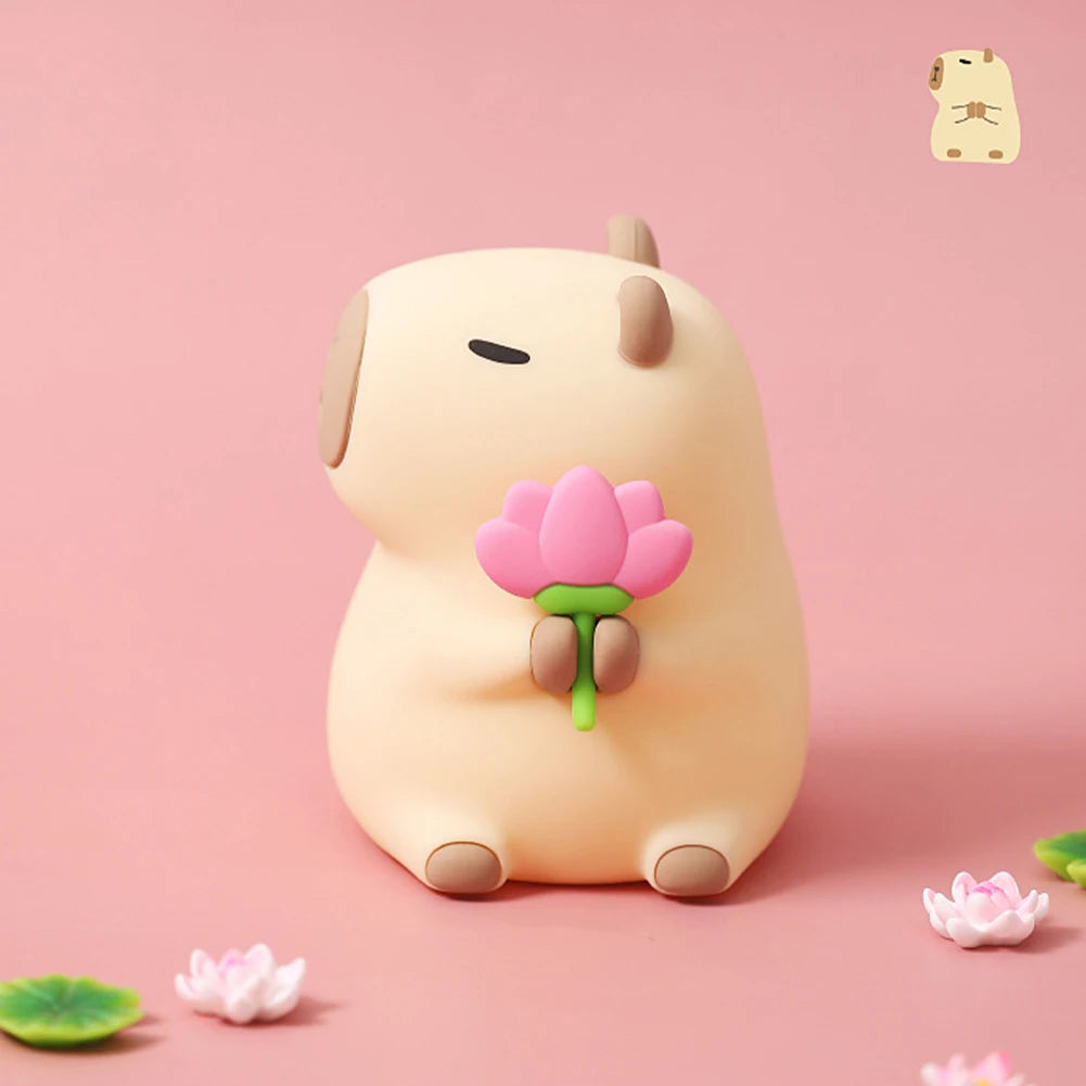 Cute kawaii cartoon dog figurine holding a pink flower on a pink background