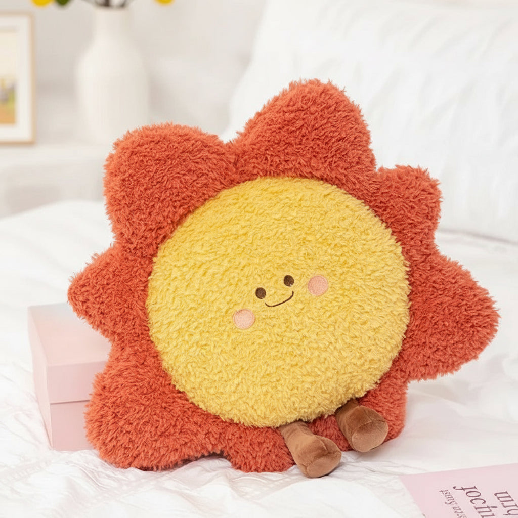 Fluffy sun-shaped kawaii pillow with a smiling face on a white surface