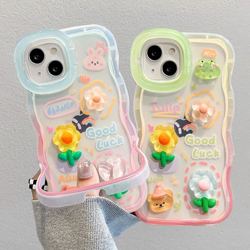 Two phone cases with kawaii cute designs and text on a gray background