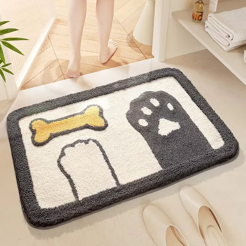 Decorative Kawaii doormat with a dog bone and paw print design on a light wood floor.