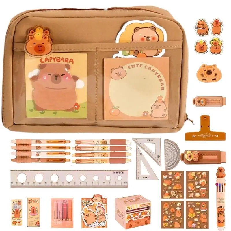 Stationery set with kawaii capybara-themed items including a pouch, pens, and stickers on a beige background.
