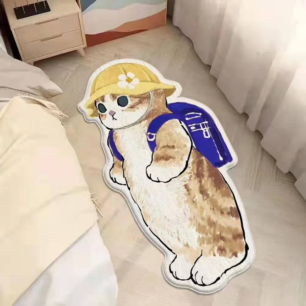 Kawaii cat-shaped mat with a yellow hat and blue backpack on a light-colored floor.