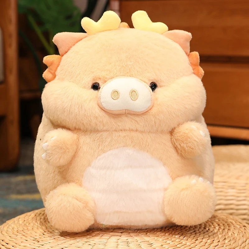 Kawaii plush toy resembling a pig with dinosaur horns on a woven mat