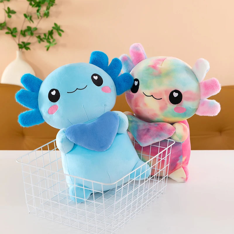 Two colorful kawaii plush toys, one blue and one tie-dye, in a white basket with a neutral background.