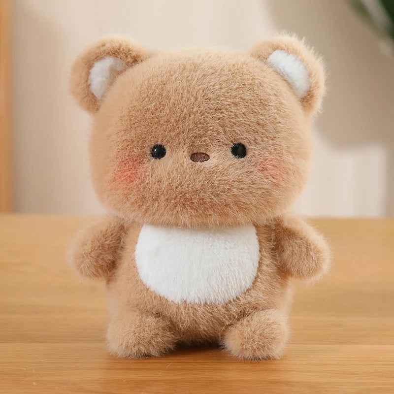 Cute plush bear kawaii toy with a white belly on a wooden surface