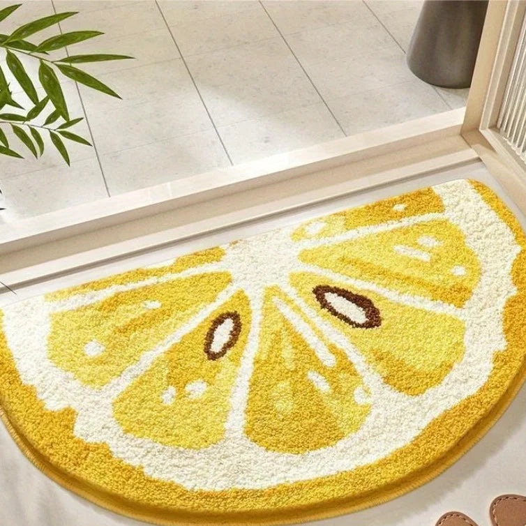 Round yellow Kawaii lemon slice rug on a tiled floor with a plant in the corner.