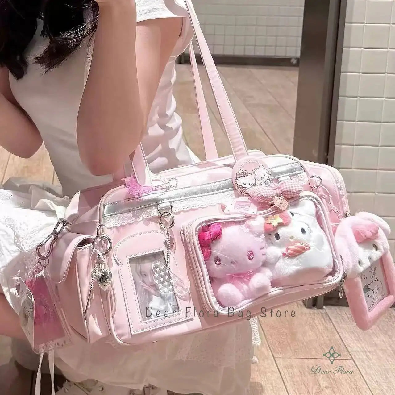 Pink Kawaii handbag with plush toy and decorative elements, featuring 'Dear Flora Bag Store' branding.