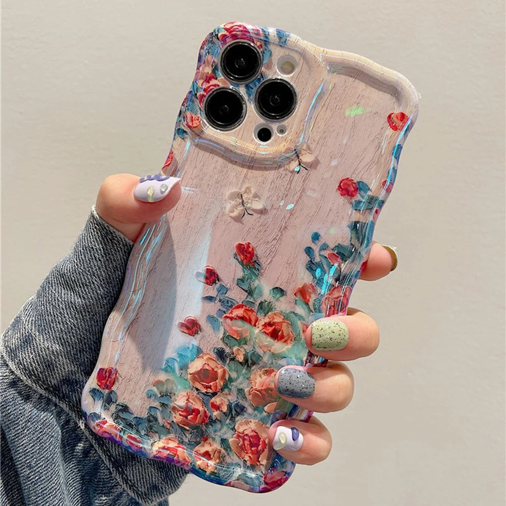 Phone case with floral kawaii design held by a hand against a neutral background