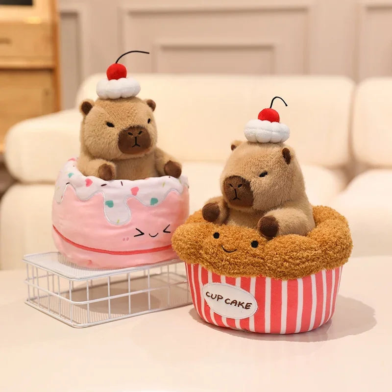 Two kawaii plush toys shaped like bears in cupcake and donut forms on a light-colored surface.