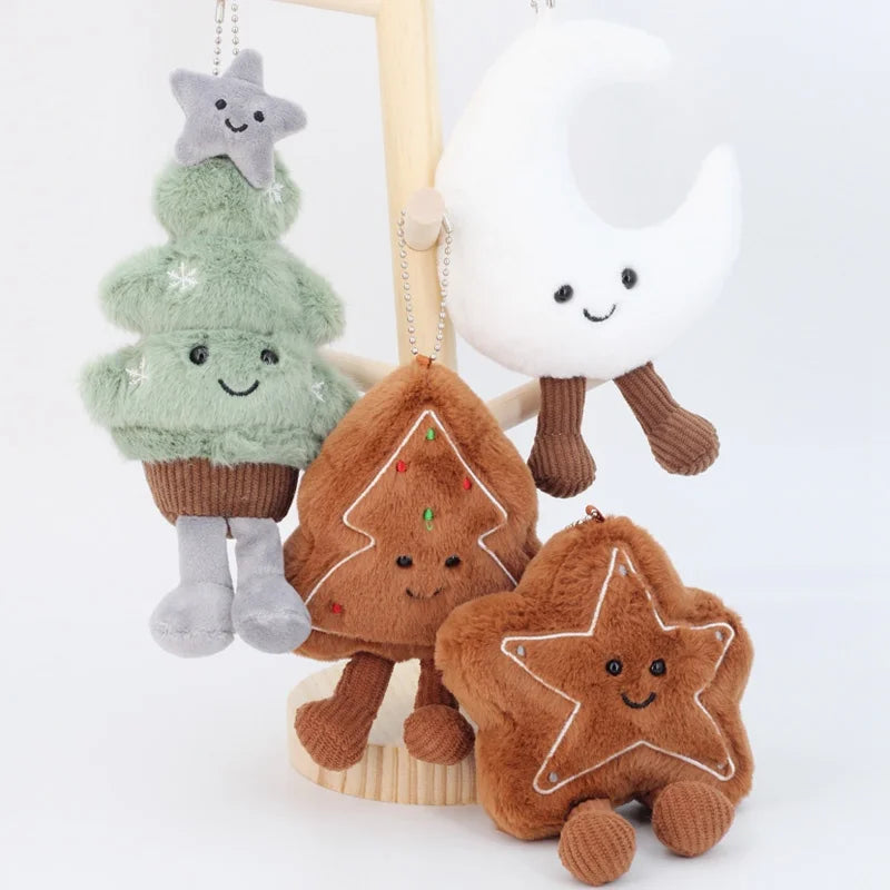 Set of kawaii plush Christmas-themed toys including a tree, gingerbread man, and star on a white background.
