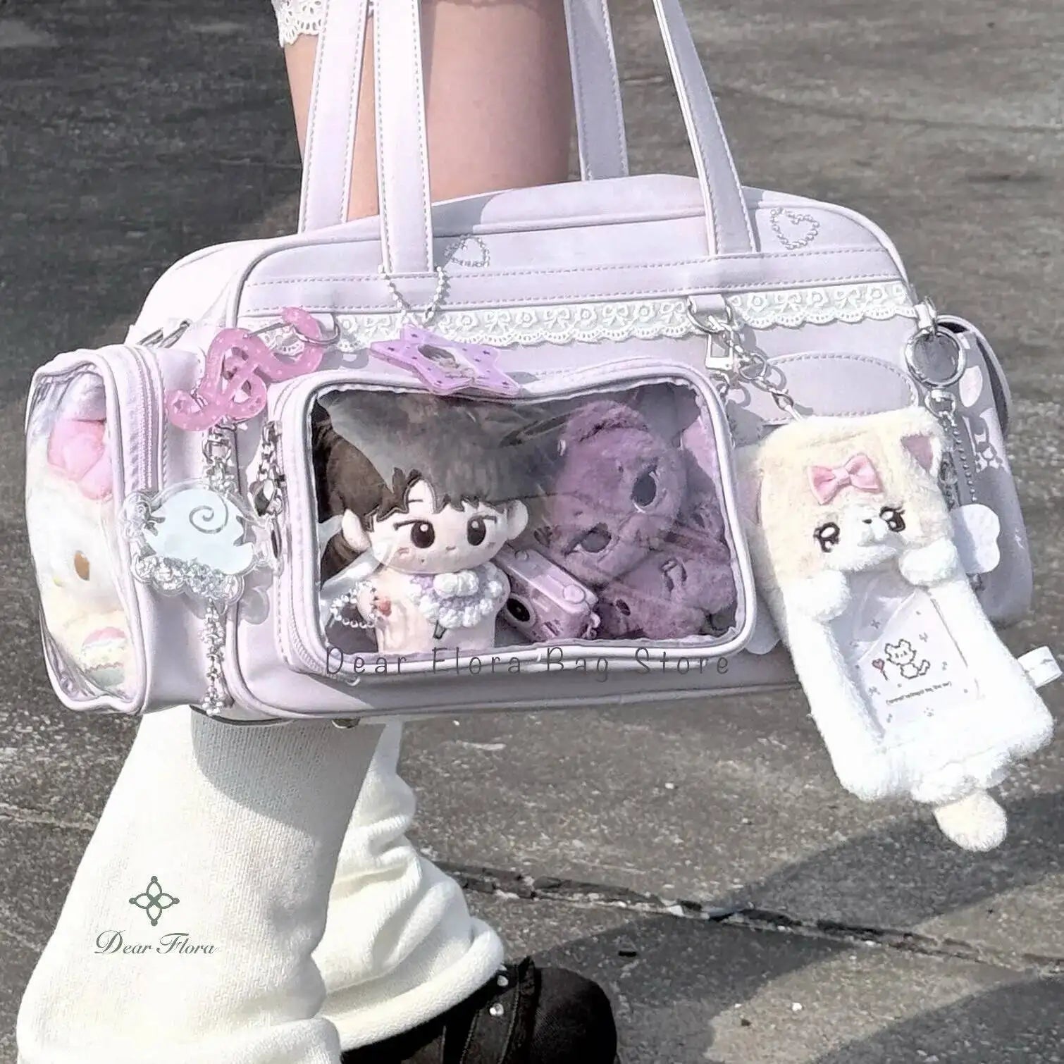 Transparent Kawaii handbag with plush toys and decorative elements on a dark background