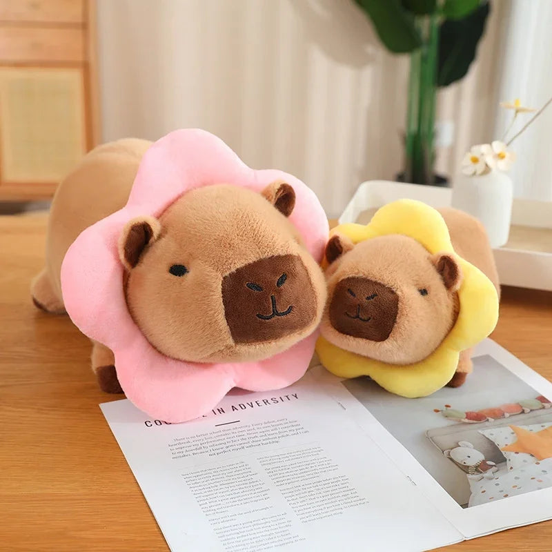 Two kawaii plush toys resembling bears with flower-like heads on a table.