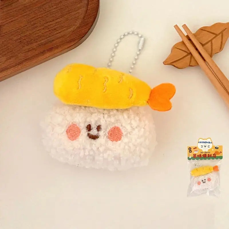 Yellow kawaii plush keychain with a face on a white surface