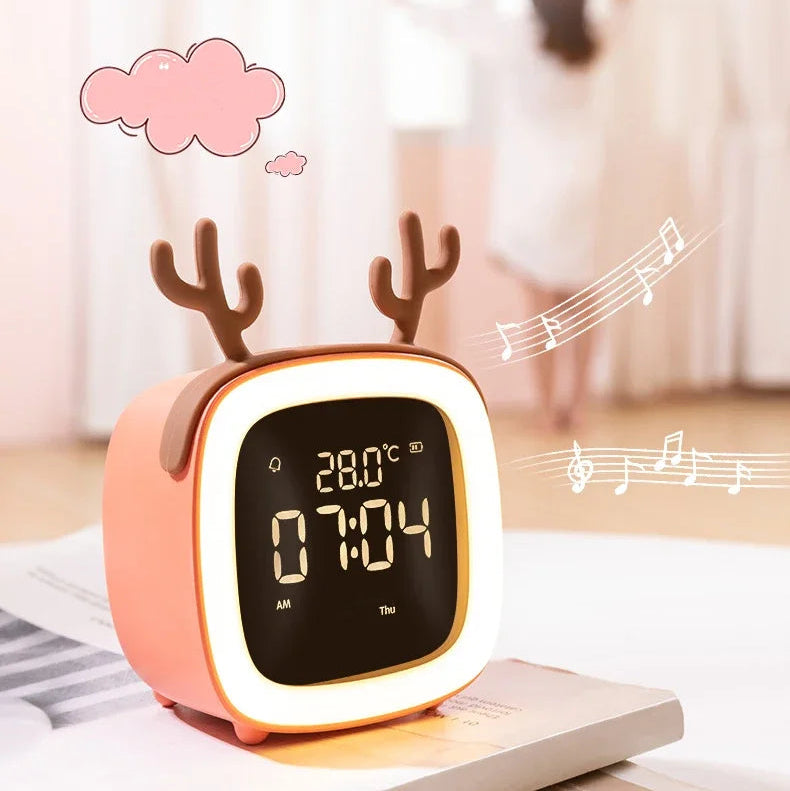 Kawaii digital clock with reindeer design on a table