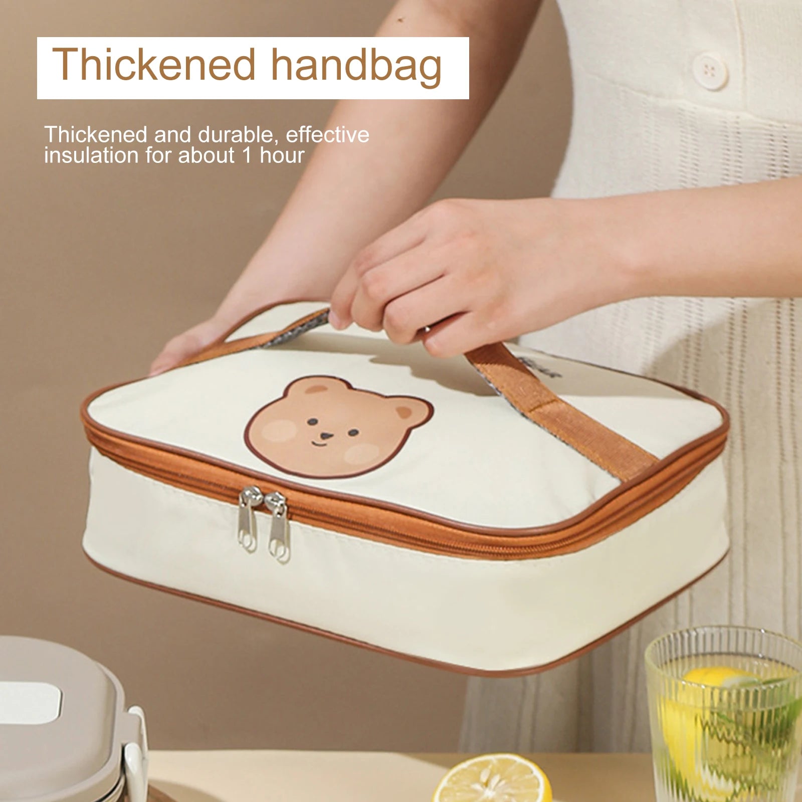 Thickened handbag with kawaii bear design held by a person, on a neutral background.
