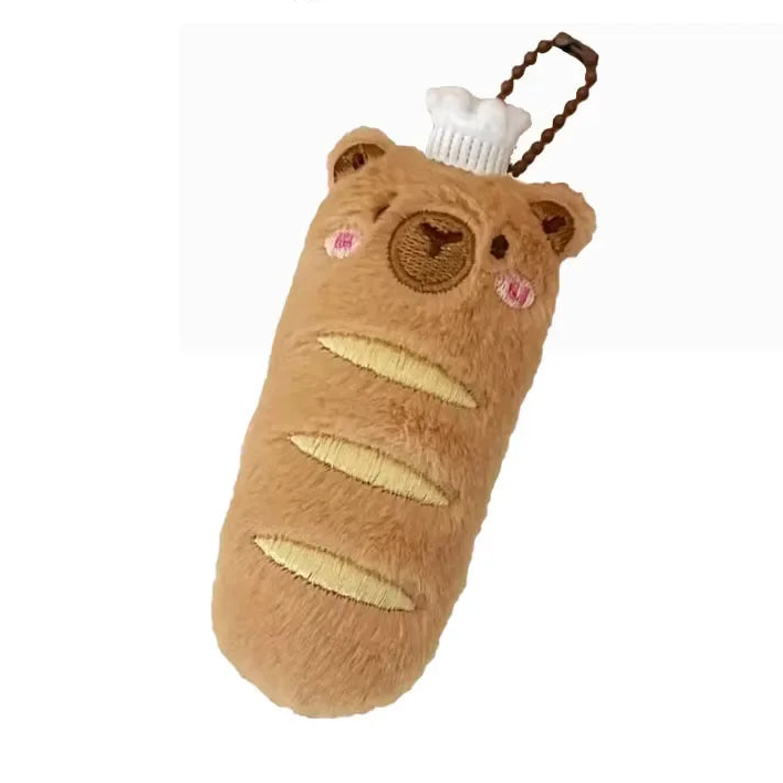 Plush toy shaped like a kawaii bread roll with bear ears on a white background