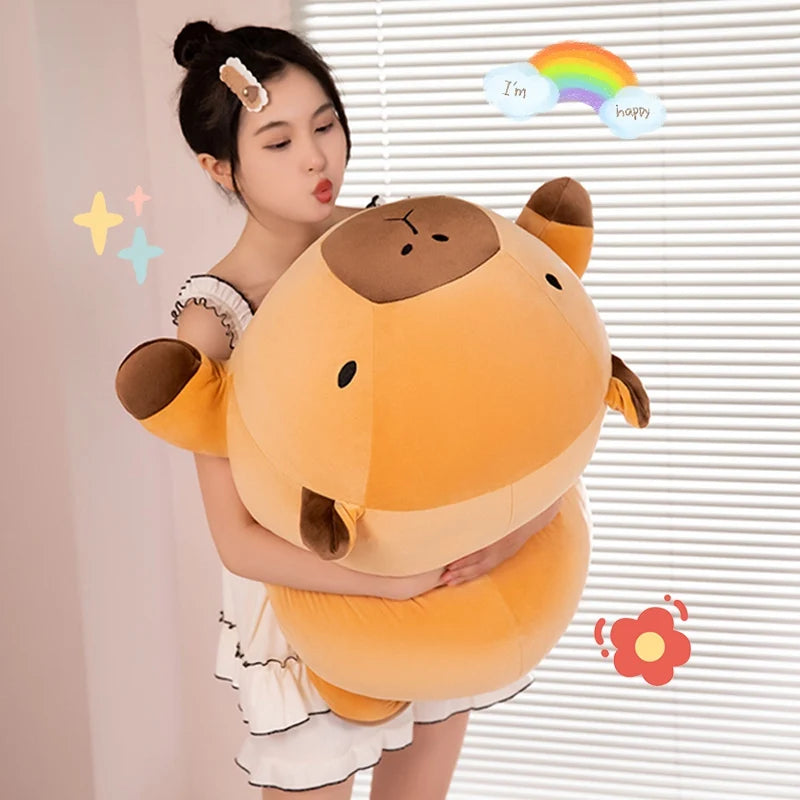 Person holding a large kawaii plush toy shaped like a cartoon character with colorful graphics around.