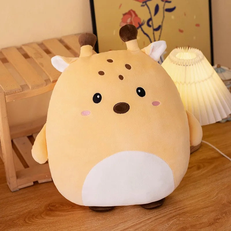 Kawaii plush toy resembling a cartoonish animal on a wooden floor with a lamp in the background