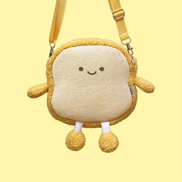 Plush toy shaped like a sandwich with a Kawaii smiling face on a yellow background