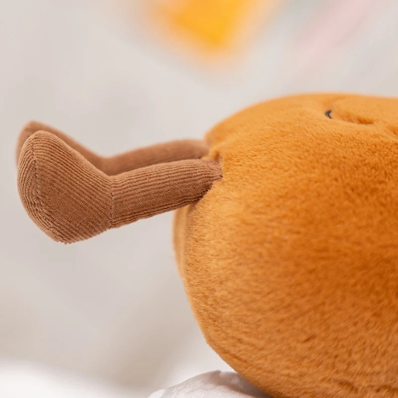 Close-up of a plush kawaii toy resembling a bird with a blurred background