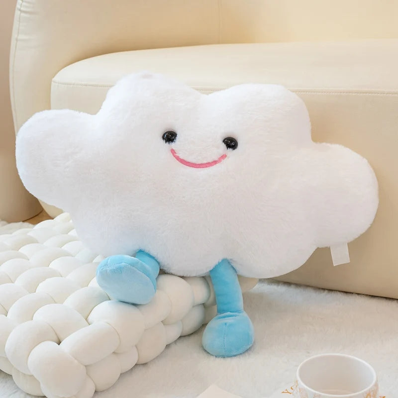 Kawaii plush cloud toy with a smiley face on a beige couch