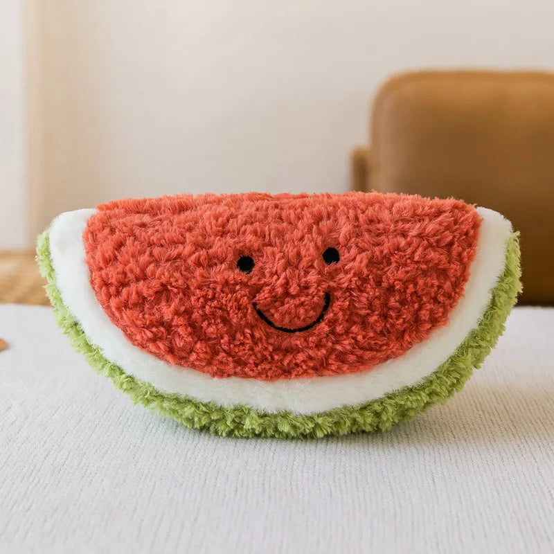 Kawaii plush toy shaped like a watermelon slice with a smiley face on a light background
