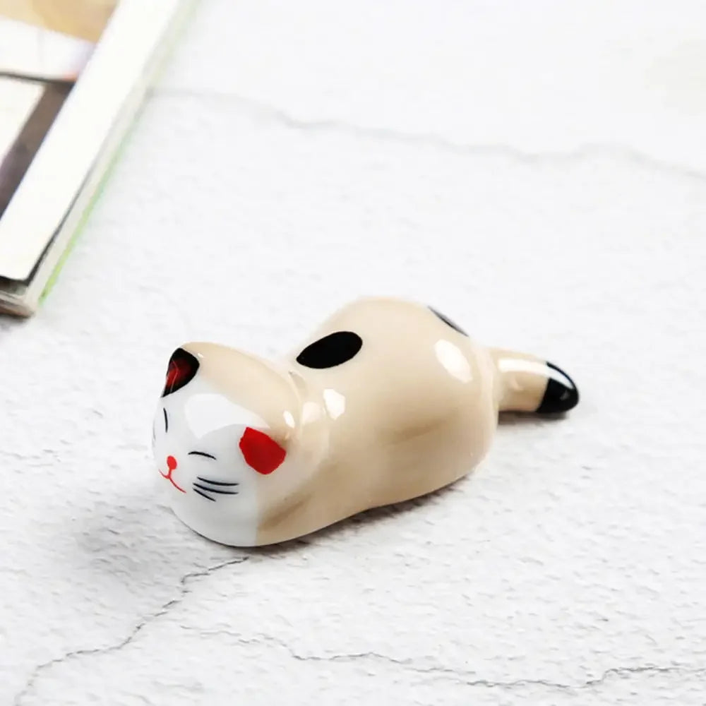 Cat-shaped kawaii ceramic product on a marble surface