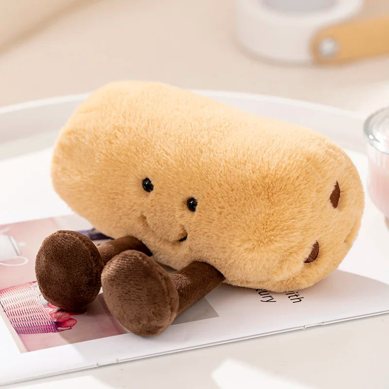 Plush kawaii toy shaped like a bread roll with a face on a magazine