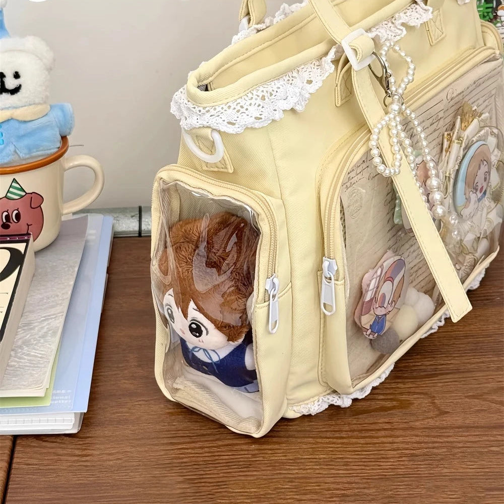 Beige Kawaii bag with transparent side showing a small brown dog, on a wooden surface.