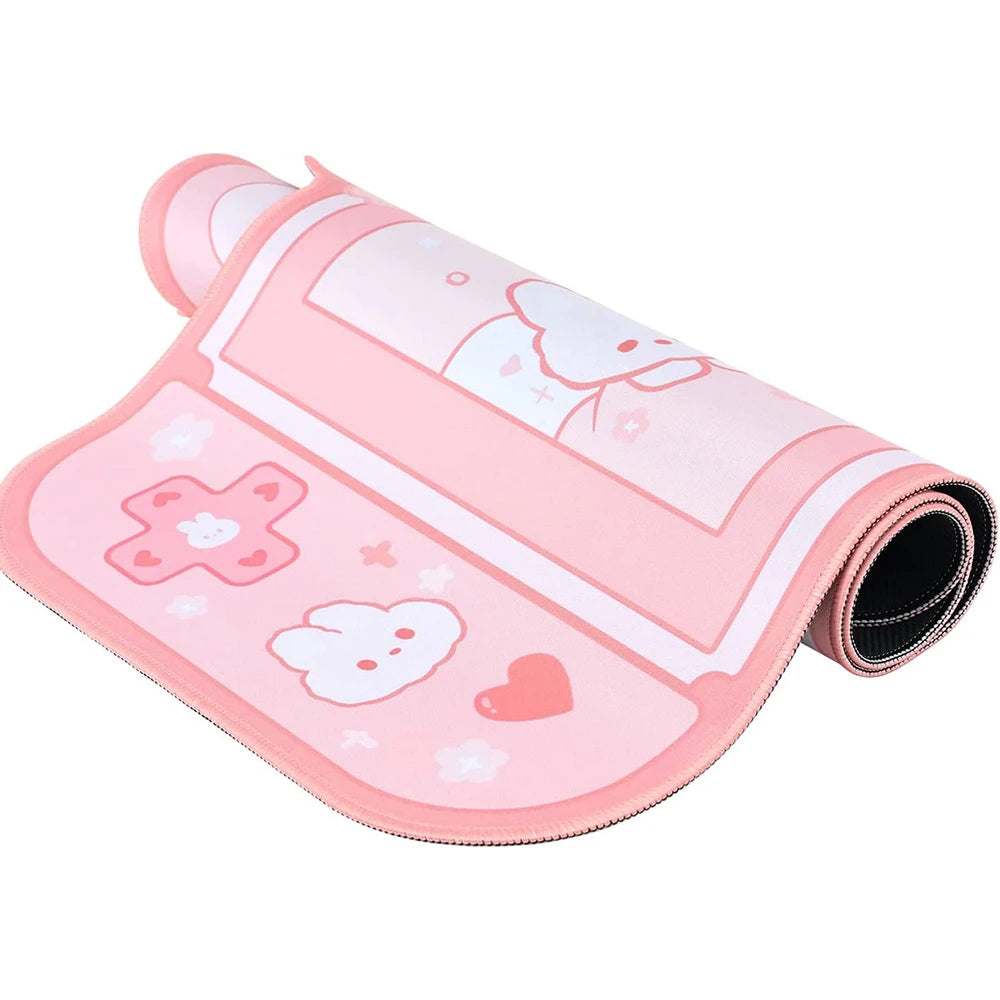 Pink gaming mouse pad with Kawaii cartoon character design on a white background