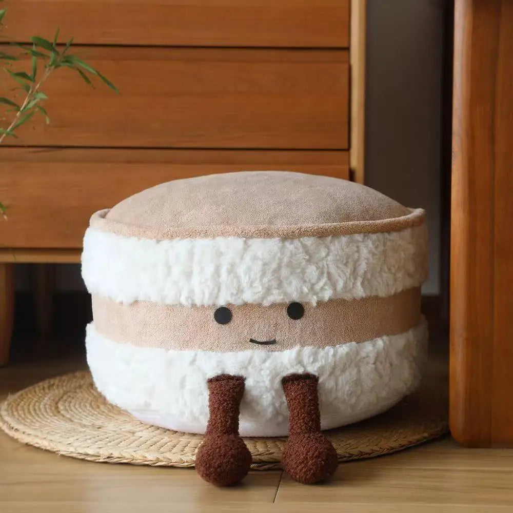 Round kawaii cushion with a face design on a wooden floor