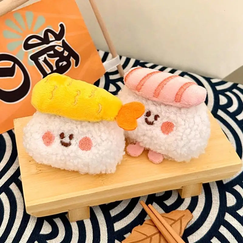 Two plush toys resembling kawaii sushi on a wooden board with a colorful background.