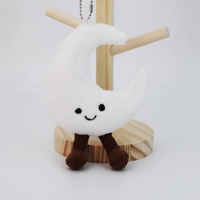 Plush toy with a kawaii smiling face on a wooden stand against a white background