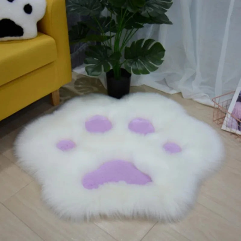 Fluffy white kawaii rug with purple paw prints in a living room setting