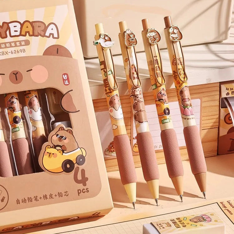 Set of kawaii cartoon-themed pens with packaging on a wooden surface