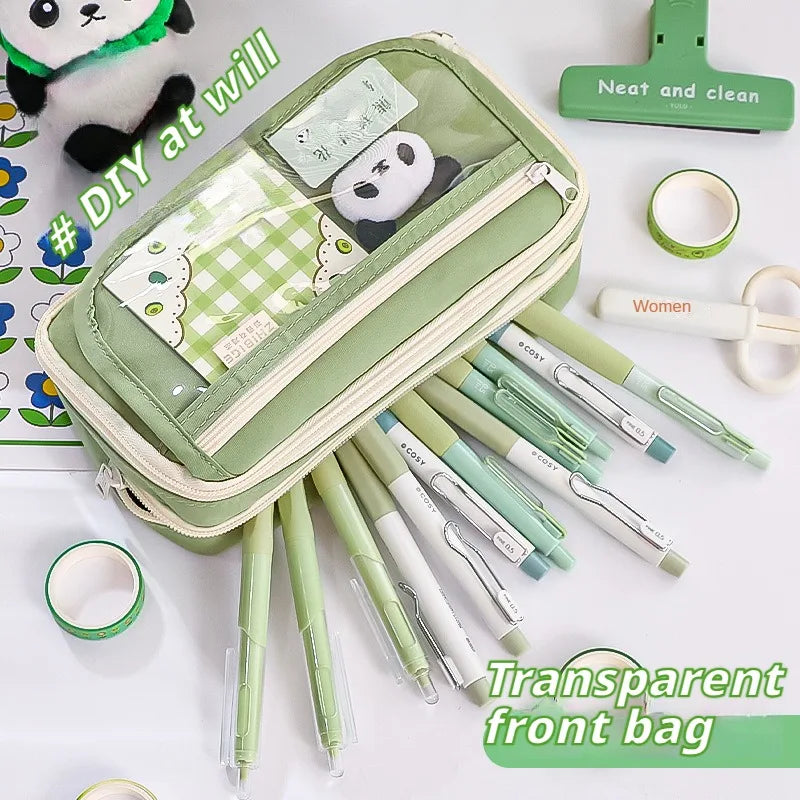 Green kawaii pencil case with stationery items on a white background