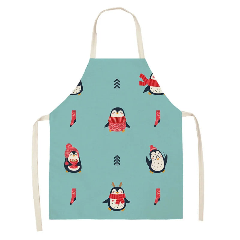 Children's apron with penguin Kawaii design on a light blue background