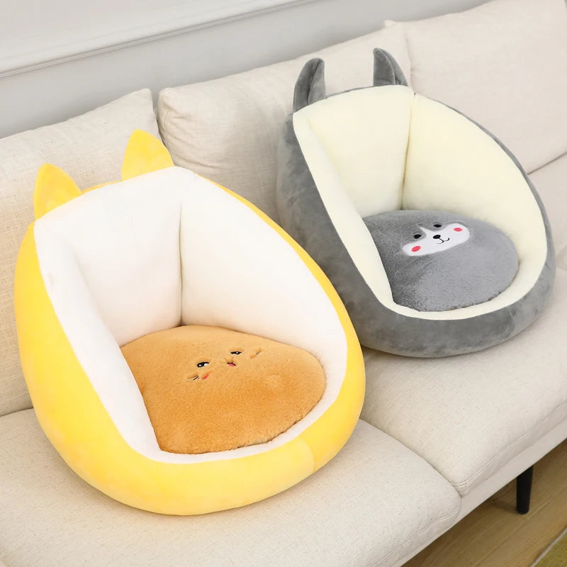 Two cute animal-shaped kawaii cushions, one yellow and one gray, on a beige couch.