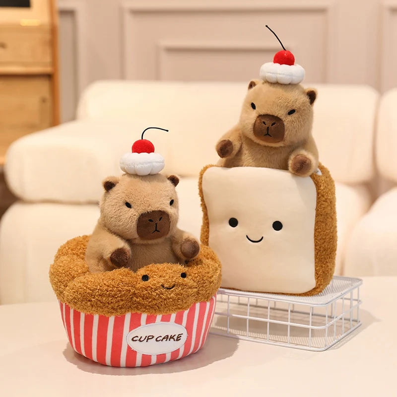 Set of cute kawaii plush toys including a bear in a cake, another bear in a cupcake, and a square plush toy with a smiley face on a neutral background.