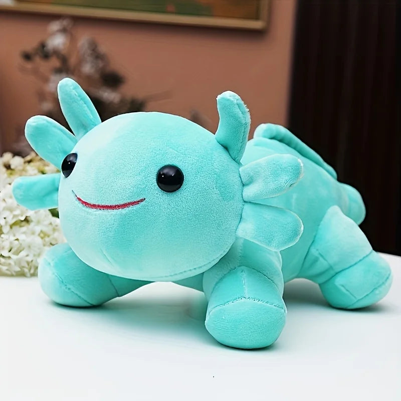 Turquoise kawaii plush toy with a smiling face on a light surface.