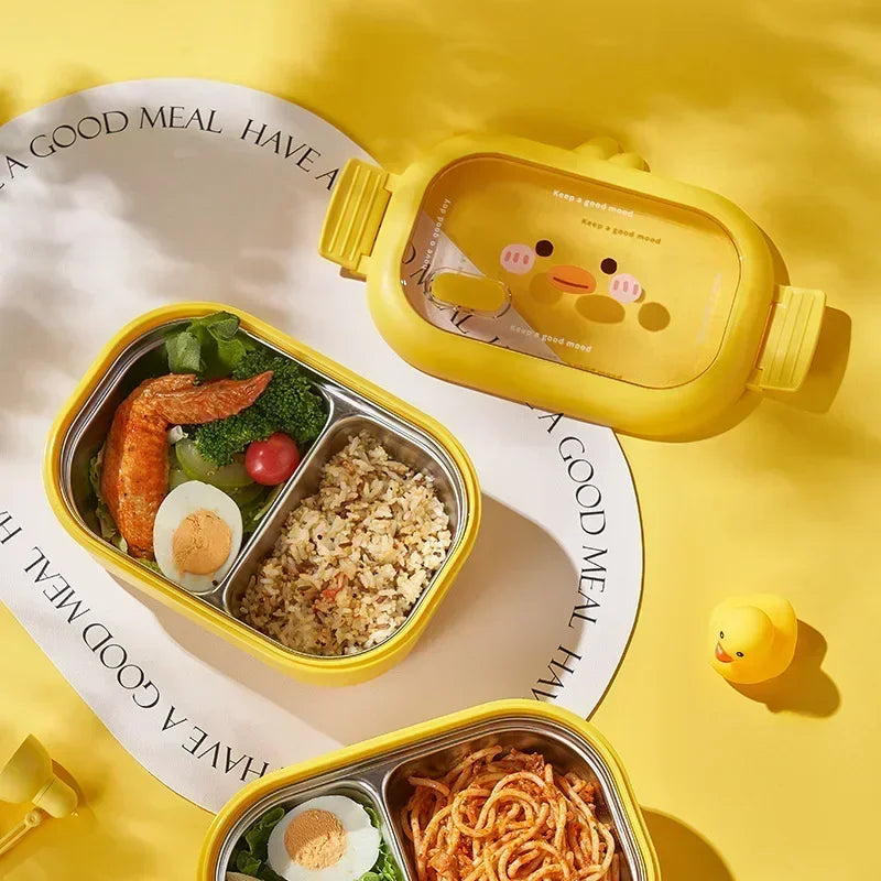 Yellow kawaii bento box with compartments of food on a yellow background