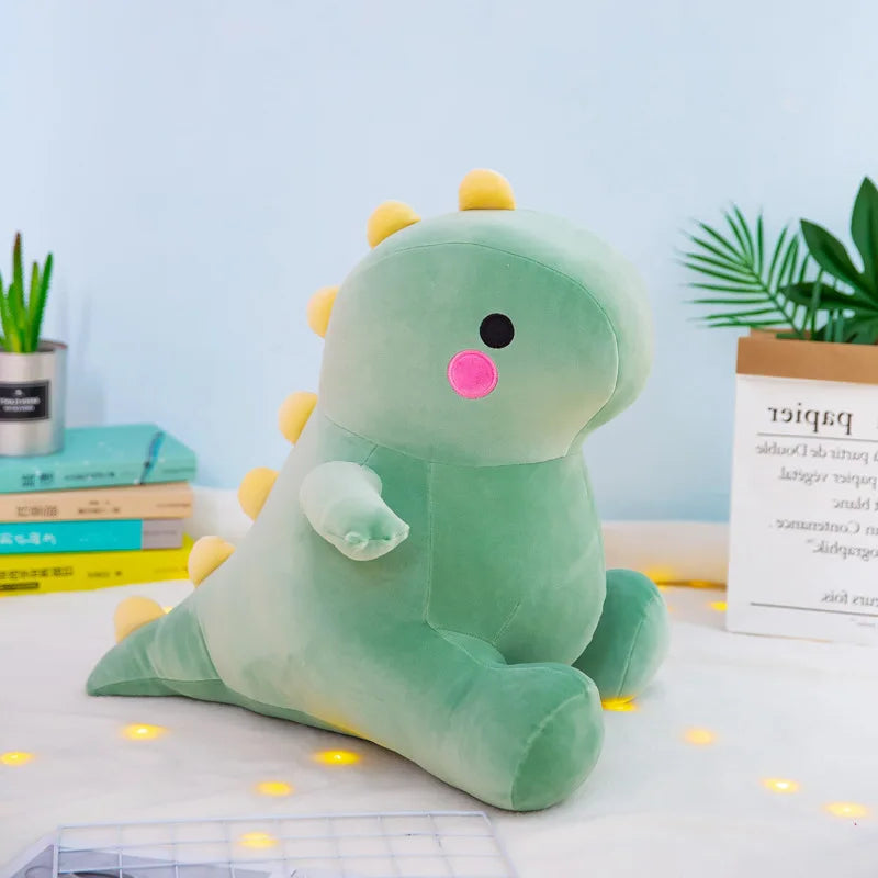 Green dinosaur kawaii plush toy on a light blue background with books and plants.