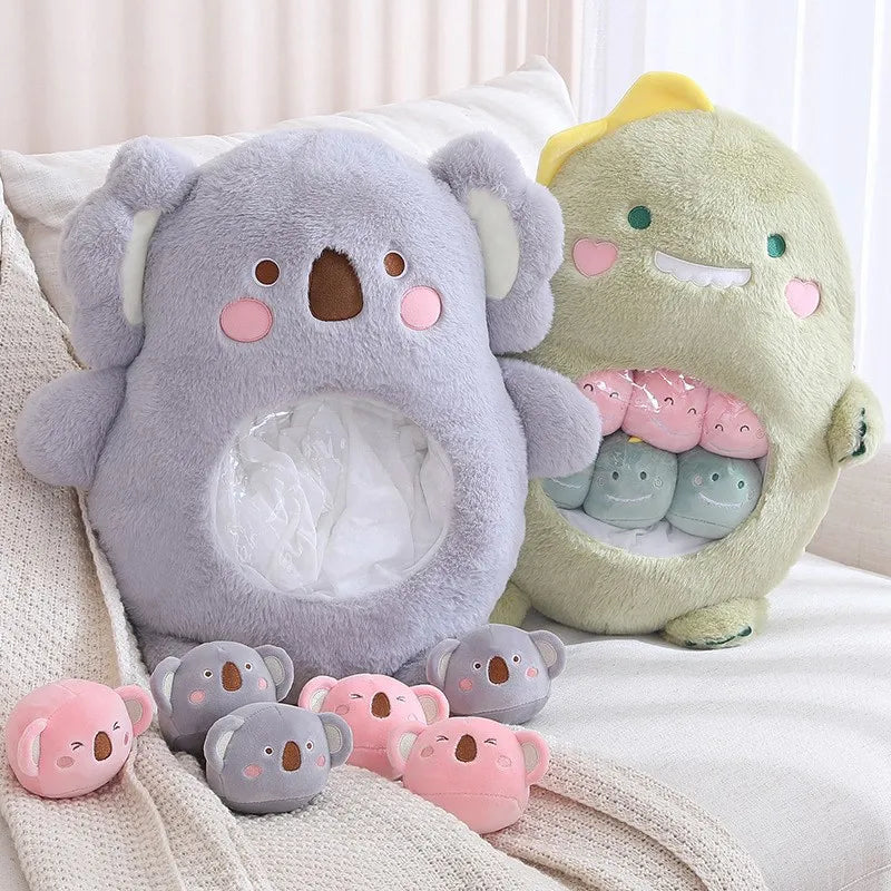 Set of kawaii plush toys including a koala and avocado-shaped ones on a soft surface.