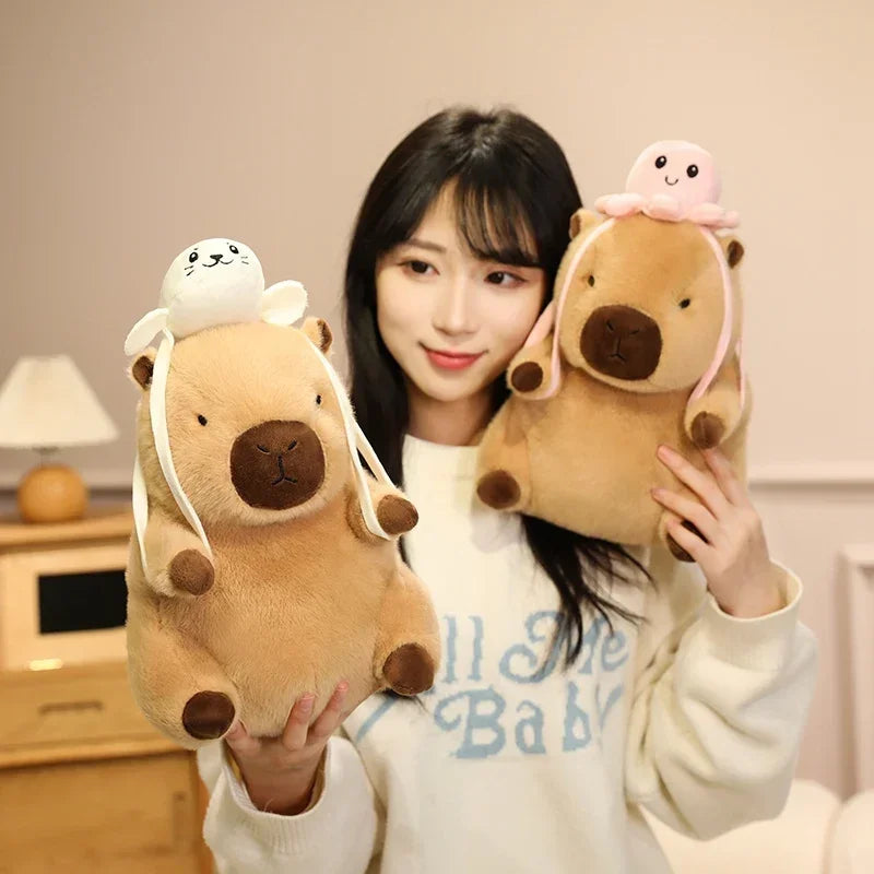 Woman holding two kawaii plush toys resembling bears with animal heads on a neutral background
