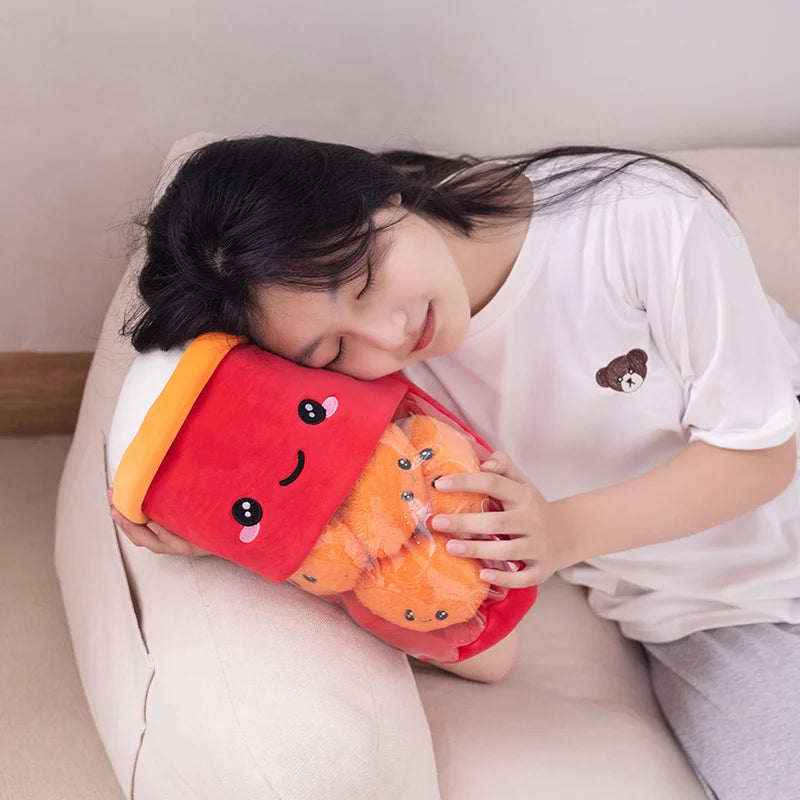 Woman lying her head down on top of a red kawaii boba tea plush toy