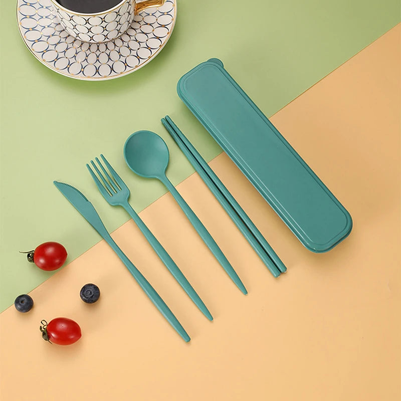 Teal kawaii cutlery set with case on a green and beige background