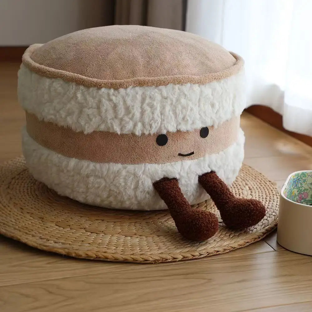 Kawaii plush toy resembling a sheep on a woven mat