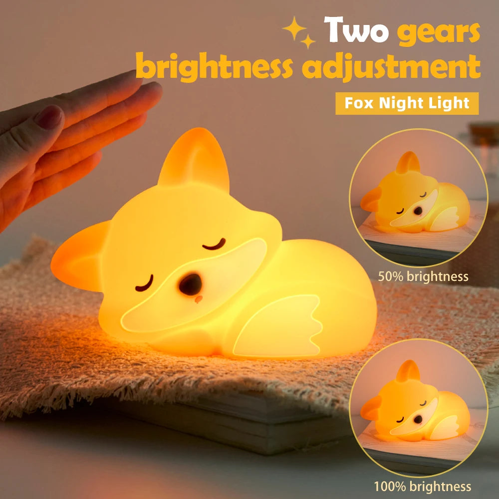 Fox kawaii night light with two brightness adjustment gears on a soft surface.