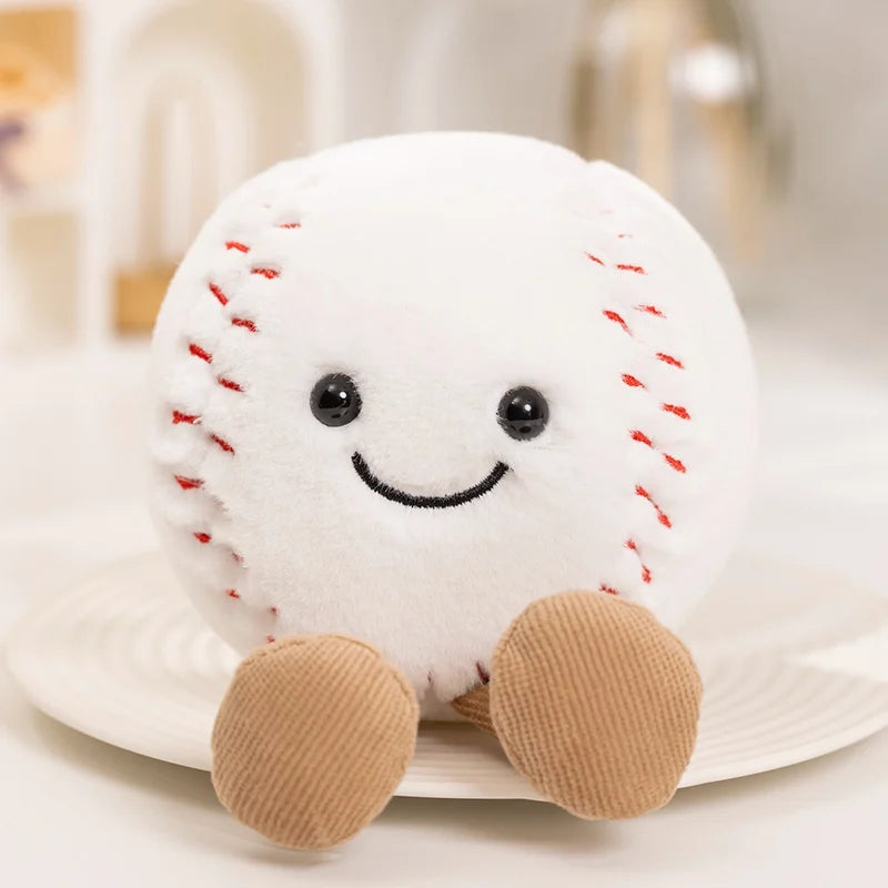 Plush kawaii toy baseball with a smiling face on a white plate